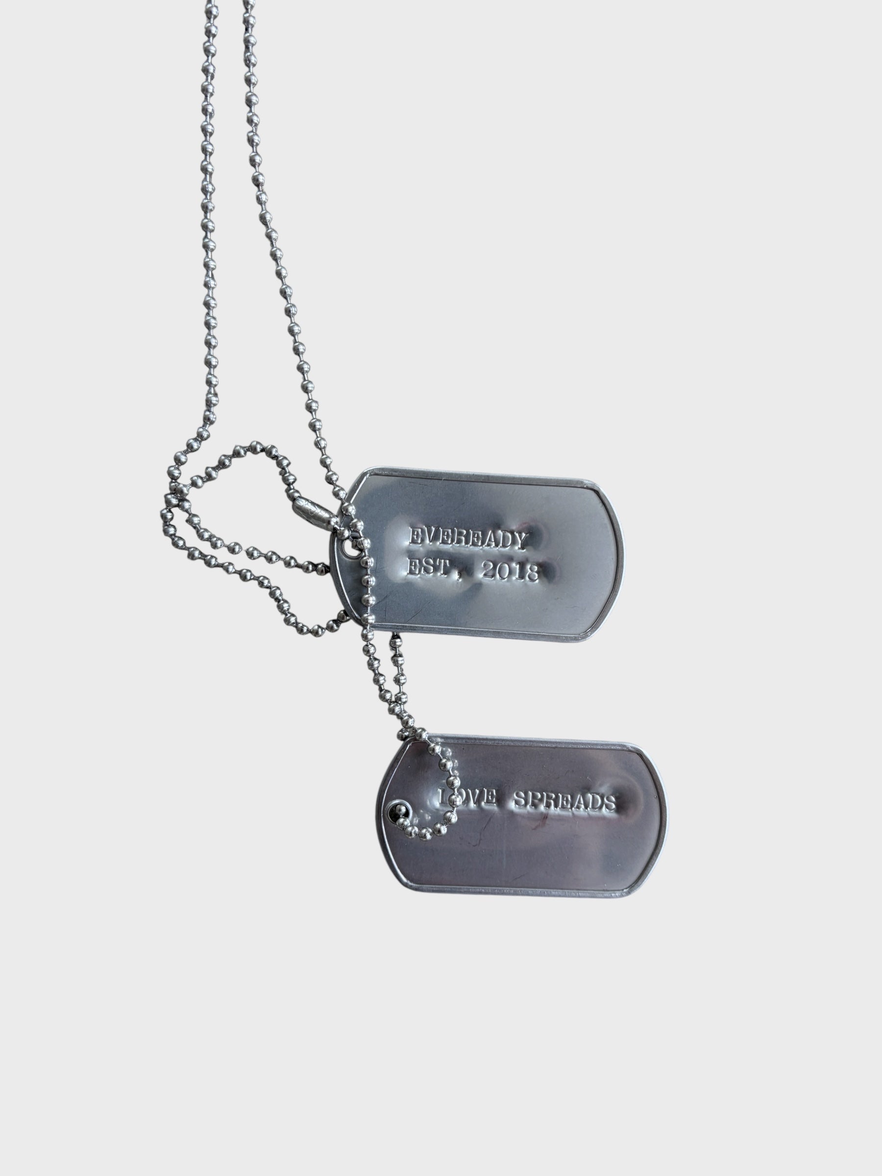 Eveready "Love Spreads" Dog Tags